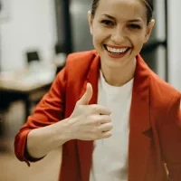 business woman happy thumbs up